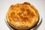 Deep puff pastry pie filled with leeks, chicken and mushrooms.