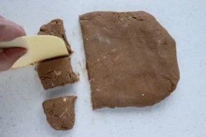Divide and weigh dough into regular pieces